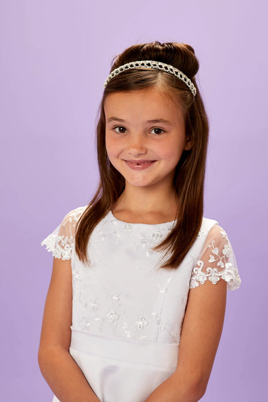 Diamante Communion tiara with three rows of crystal embellishments on a silver-tone headband.