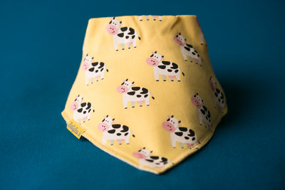 Bandana Bib in Lemon with Bessie The Cow FRONT